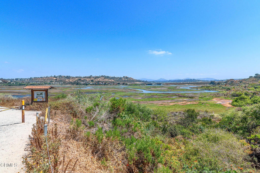 101 Rios Court Solana Beach, CA 92075 - Photo 55 of 67 a view of a lake with houses in the back