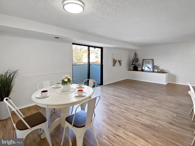 a kitchen with a stove and a refrigerator