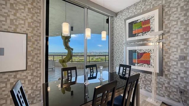a living room with furniture a rug and a window