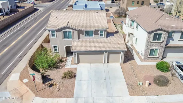 an aerial view of a house with a garden