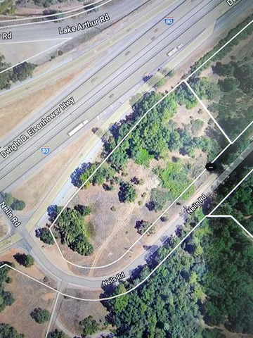 a view of a backyard with plants