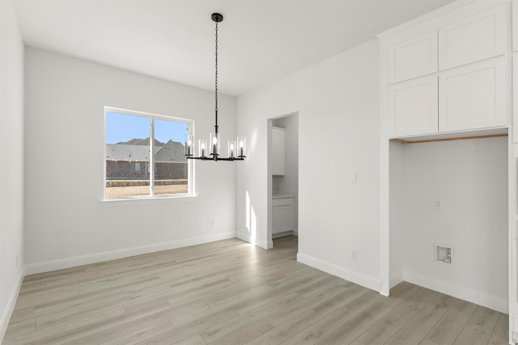 1034 Bingham Way Forney, TX 75126 - Photo 11 of 39 10_10_11. 1034 Bimgham - Dining