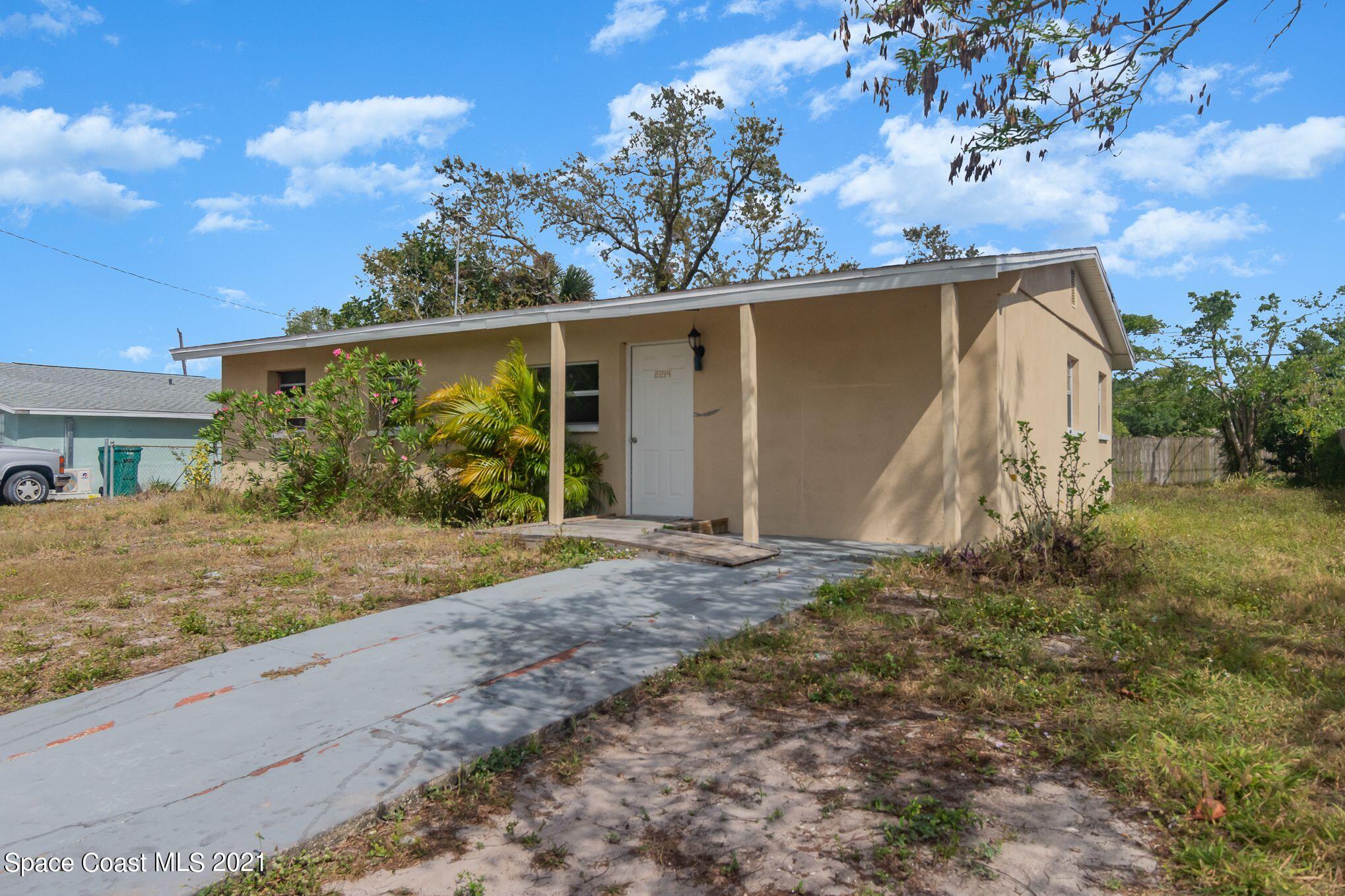 2214 Warwick Road Melbourne, FL 32935 - Photo 1 of 24 Front