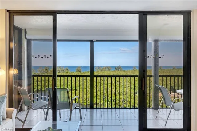 a view of balcony with furniture
