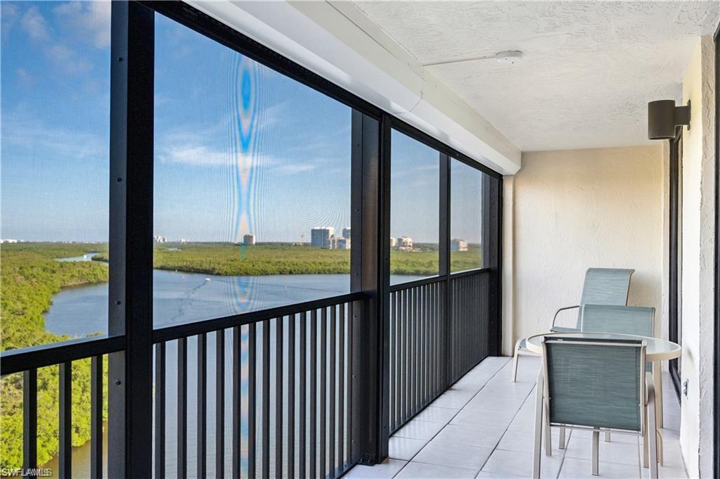 17 Bluebill Avenue, Unit 904 Naples, FL 34108 - Photo 2 of 20 a view of a balcony with chair