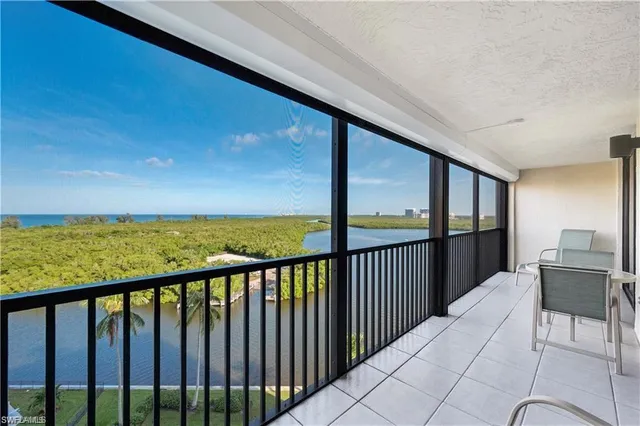 a balcony with view of ocean