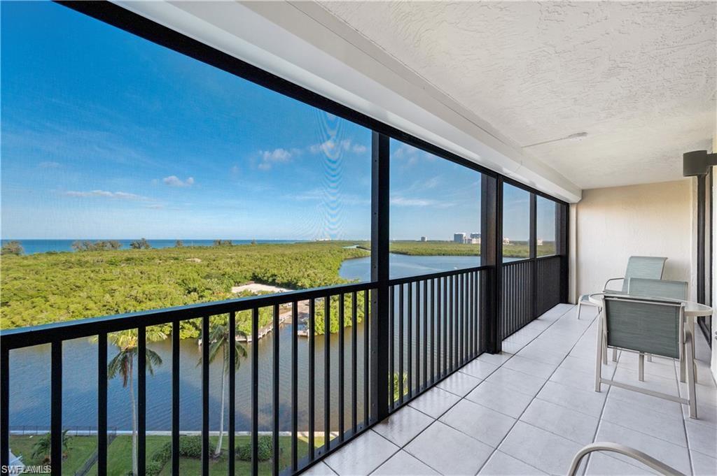 17 Bluebill Avenue, Unit 904 Naples, FL 34108 - Photo 4 of 20 a balcony with view of ocean