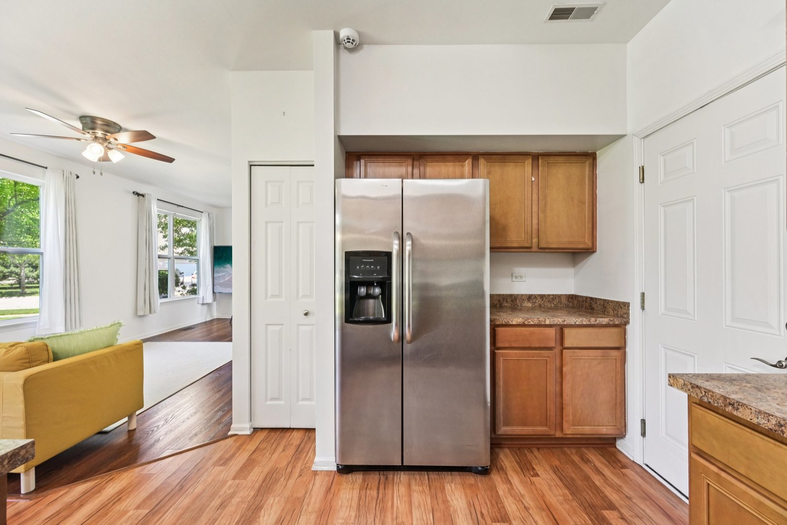 2145 Sunrise Circle Aurora, IL 60503 - Photo 13 of 29 a kitchen with a refrigerator and a sink