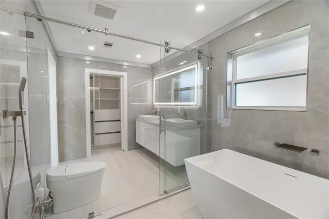 a front view of a house with a garage