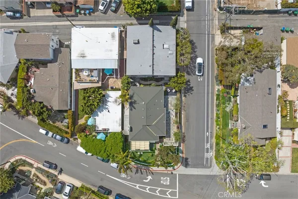 aerial view of a house with a garden and plants