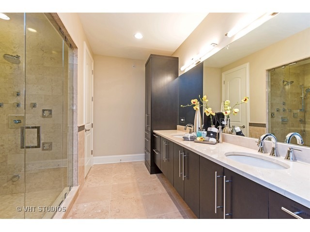 1949 Beechnut Road Northbrook, IL 60062 - Photo 16 of 25 a bathroom with a sink and a mirror