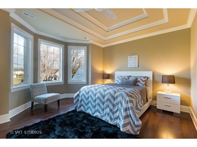 1949 Beechnut Road Northbrook, IL 60062 - Photo 19 of 25 a bedroom with a bed and a large window