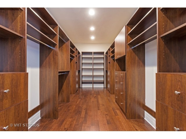 1949 Beechnut Road Northbrook, IL 60062 - Photo 23 of 25 a view of walk in closet with wooden floor