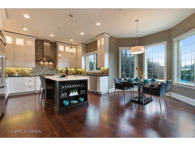 1949 Beechnut Road Northbrook, IL 60062 - Photo 8 of 25 a dining room with furniture window and wooden floor