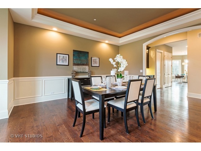 1949 Beechnut Road Northbrook, IL 60062 - Photo 10 of 25 a view of a dining room with furniture and wooden floor