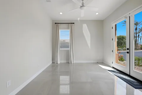 an empty room with windows