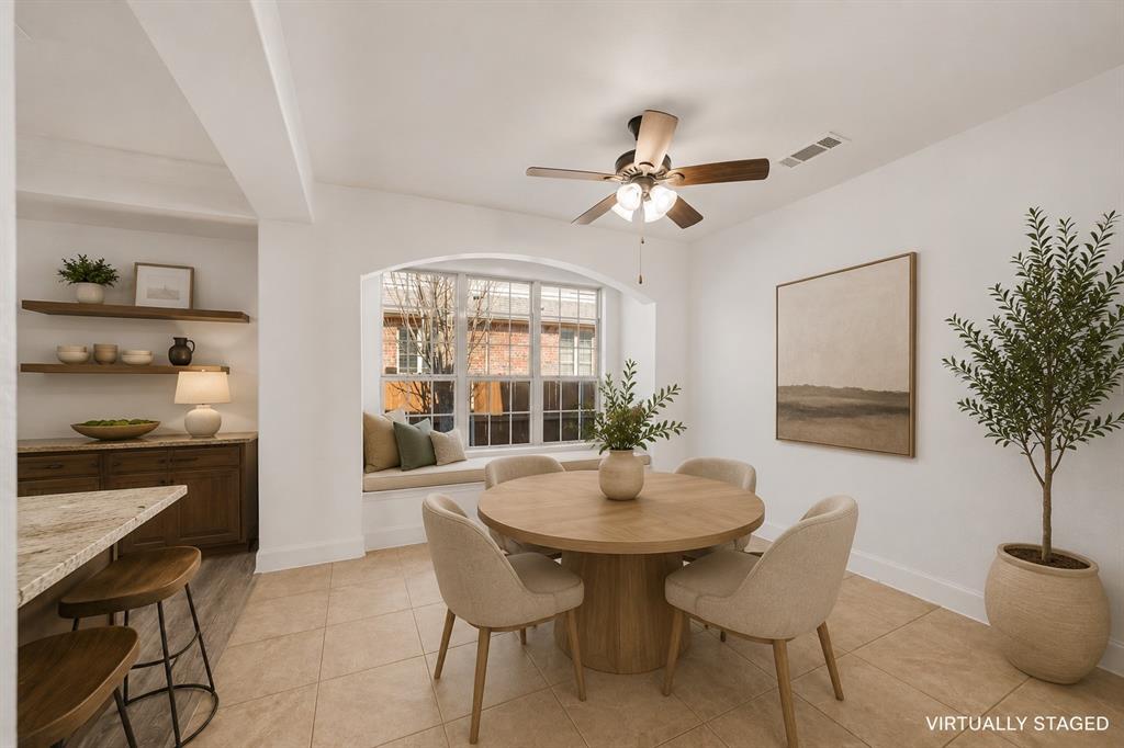 2243 Big Valley Road Allen, TX 75013 - Photo 6 of 19 Dining area featuring an arched window with an integrated window seat