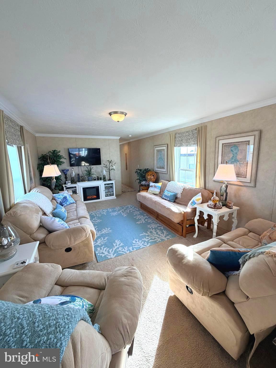 38025 Rabbit Road, Unit 101 Ocean View, DE 19970 - Photo 21 of 112 a living room with furniture and a table