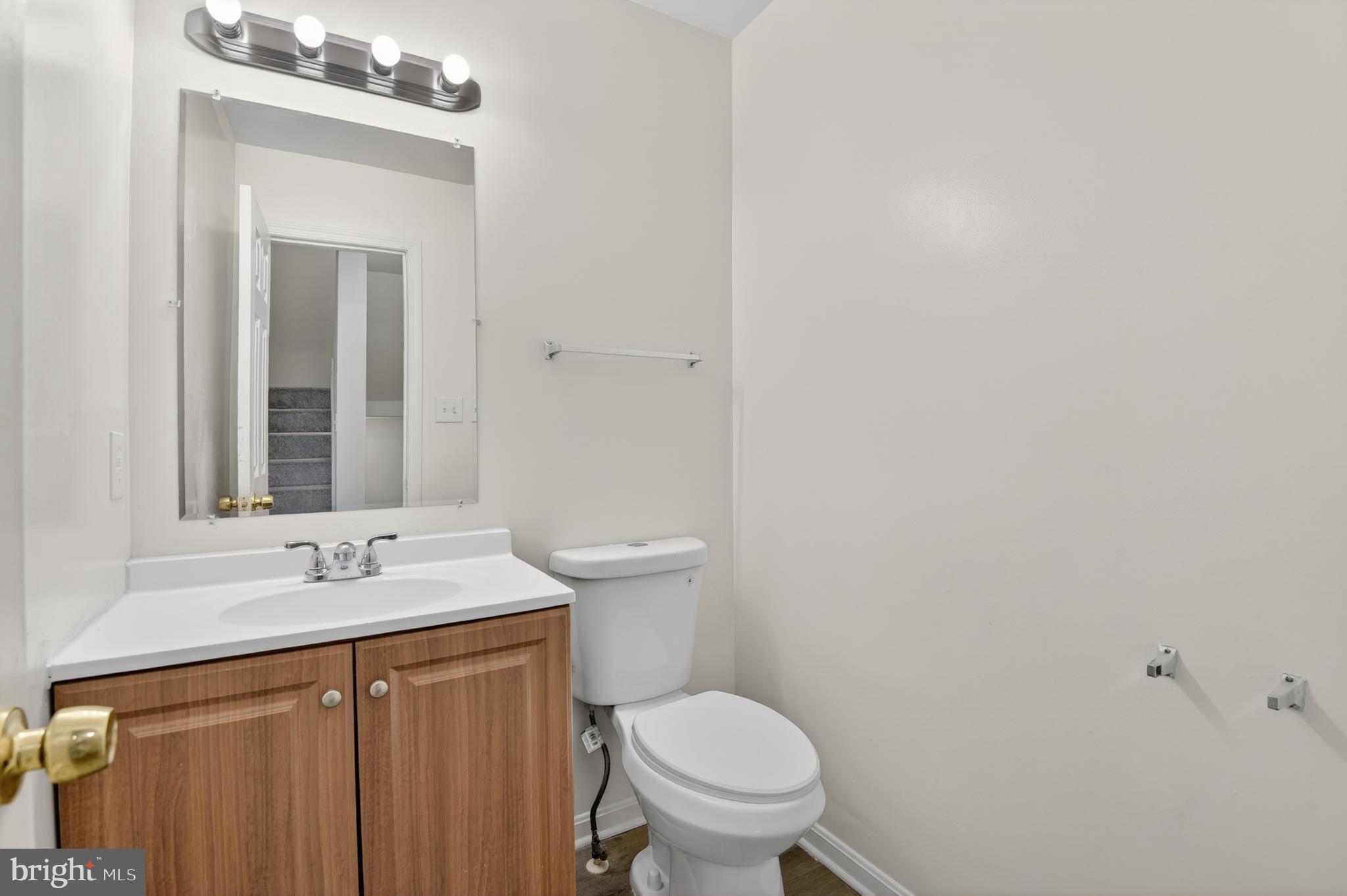 280 Brock Bridge Road Laurel, MD 20724 - Photo 14 of 22 a bathroom with a sink and a toilet
