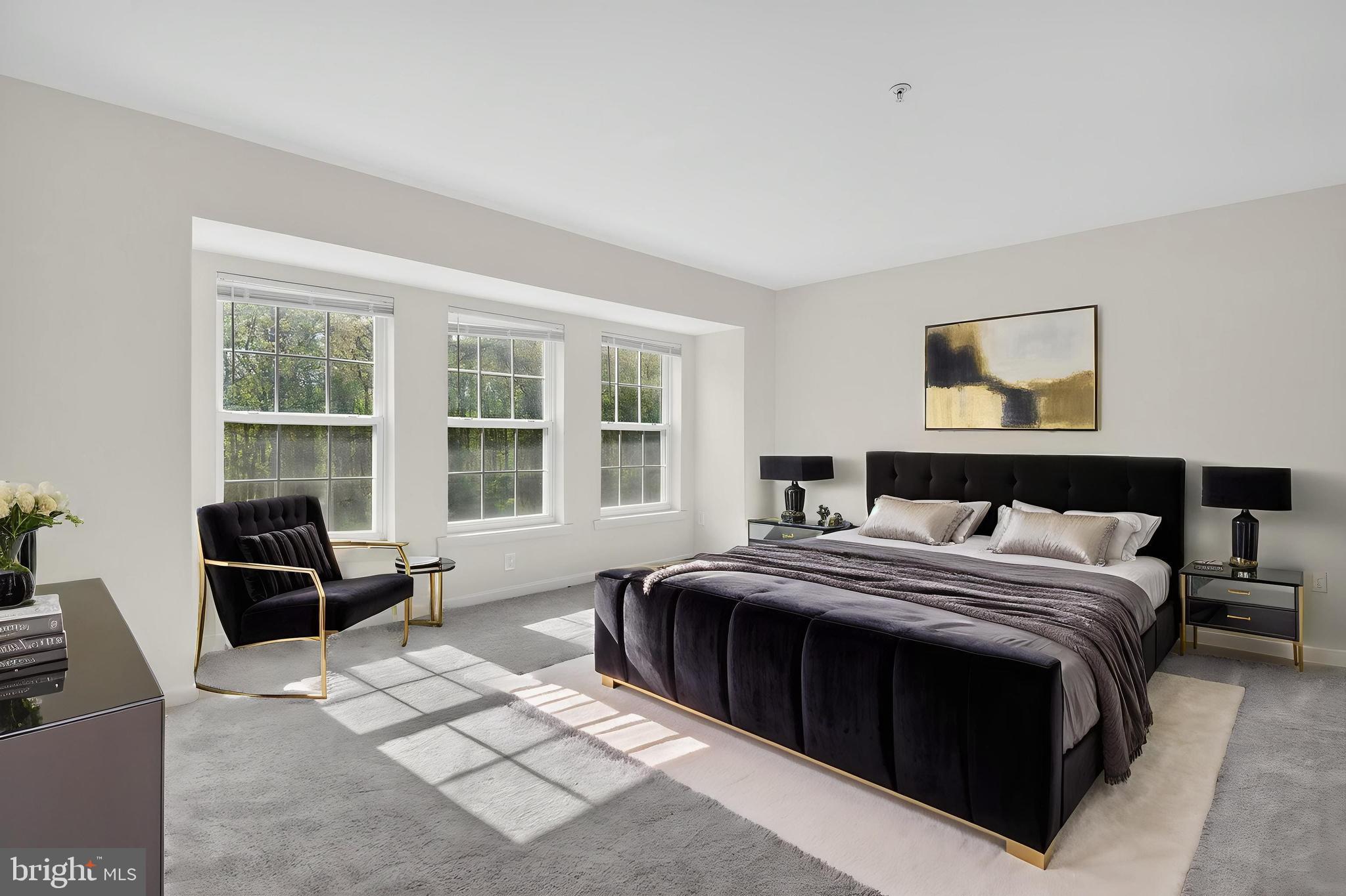 280 Brock Bridge Road Laurel, MD 20724 - Photo 15 of 22 a bedroom with a bed and a couch next to a window