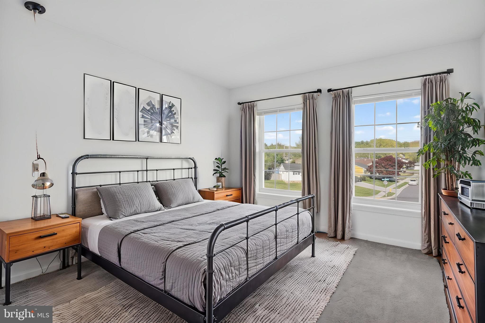 280 Brock Bridge Road Laurel, MD 20724 - Photo 18 of 22 a bedroom with a large bed and a window