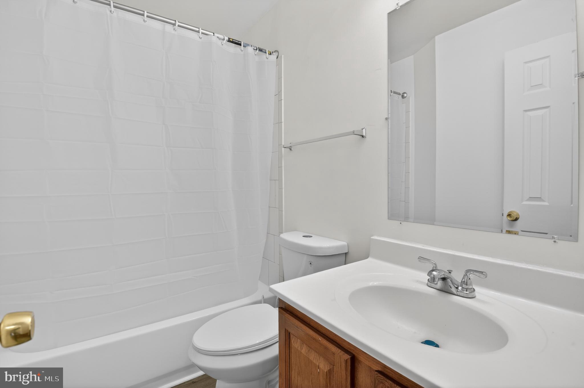280 Brock Bridge Road Laurel, MD 20724 - Photo 19 of 22 a bathroom with a sink toilet and shower