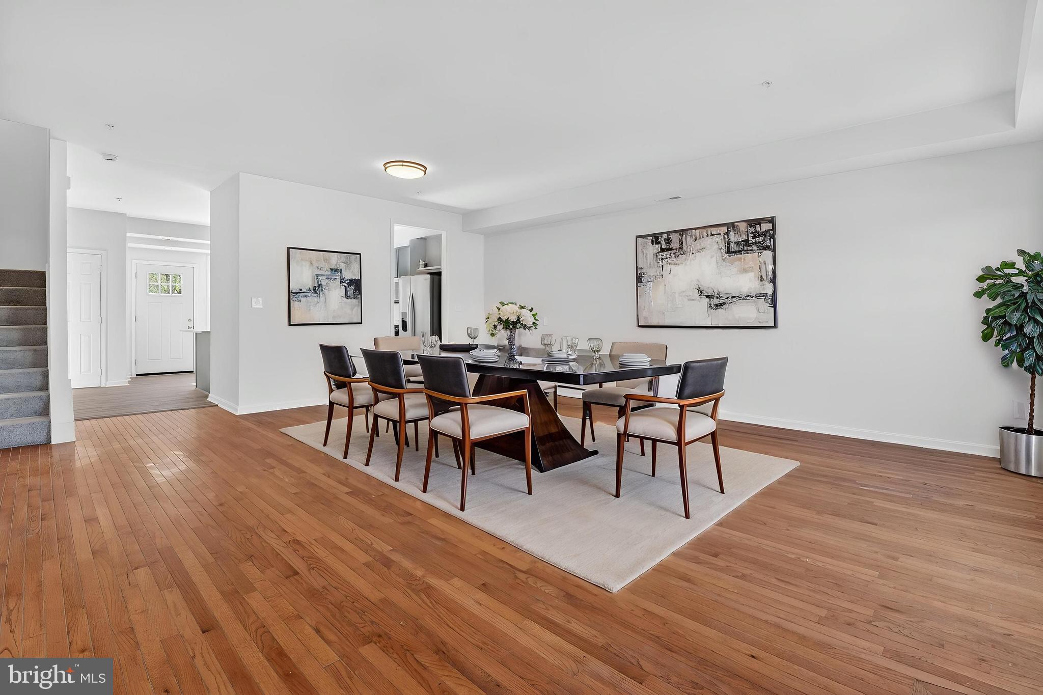 280 Brock Bridge Road Laurel, MD 20724 - Photo 5 of 22 a view of a dining room with furniture and wooden floor