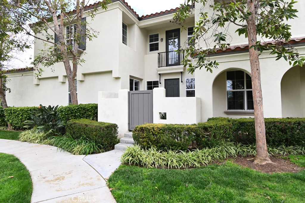232 Tuberose Irvine, CA 92603 - Photo 1 of 1 a front view of a house with a garden