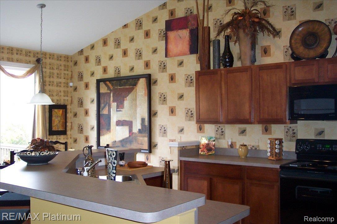 3983 Rainier Drive, Unit 2 Howell, MI 48843 - Photo 3 of 11 kitchen