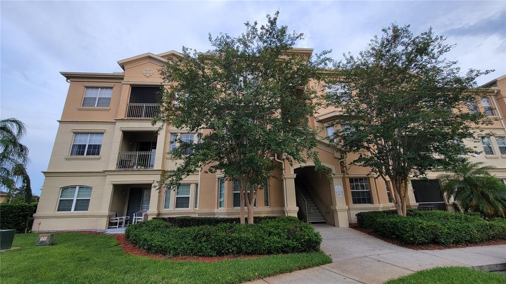 120 Terrace Ridge Circle, Unit 120 Davenport, FL 33896 - Photo 1 of 1 front view of a house with a yard