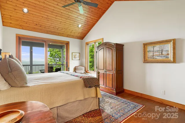 a bed room with a bed and a dresser