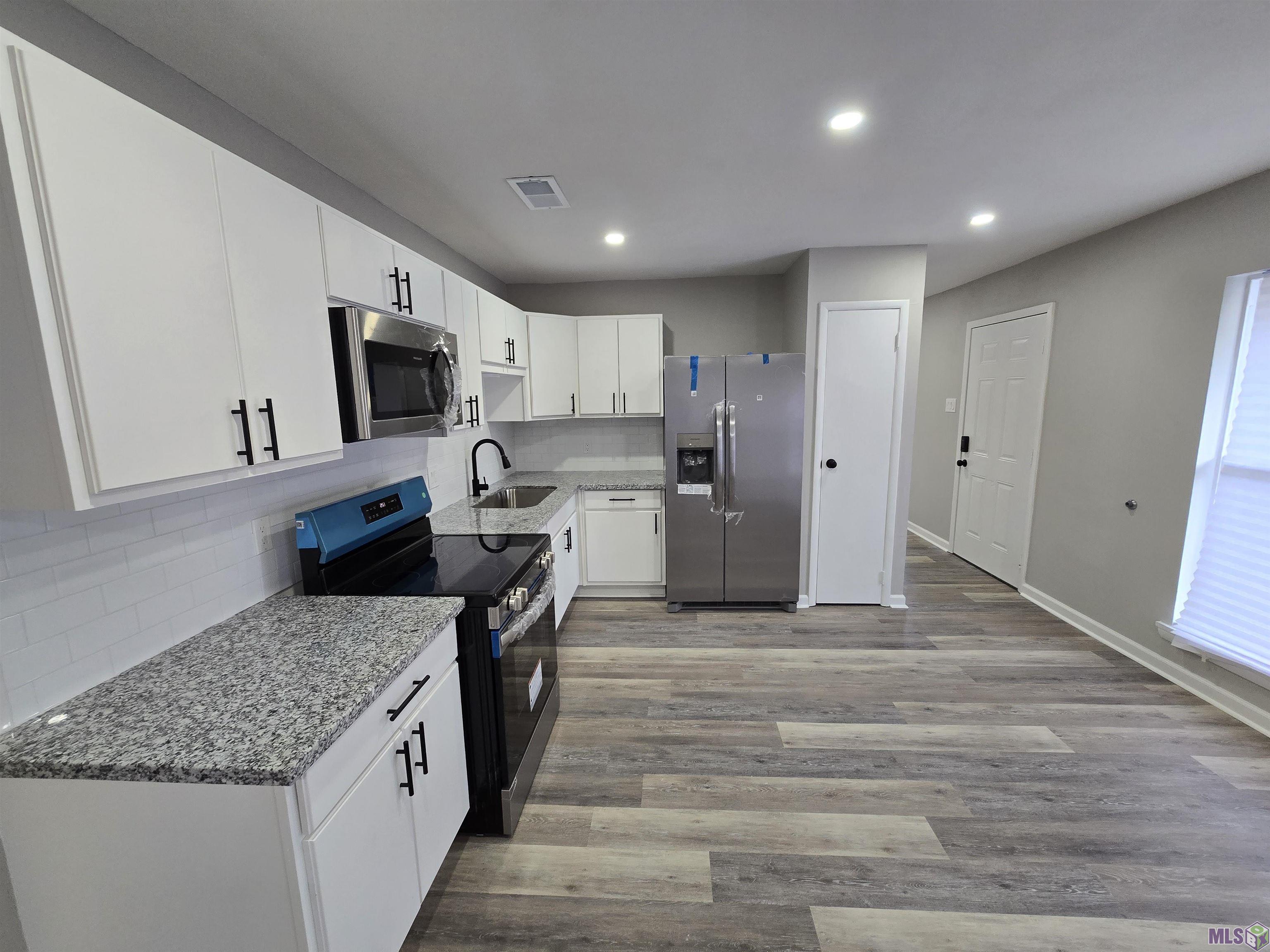 7565 Gov Blanchard Drive Baton Rouge, LA 70811 - Photo 8 of 27 Kitchen