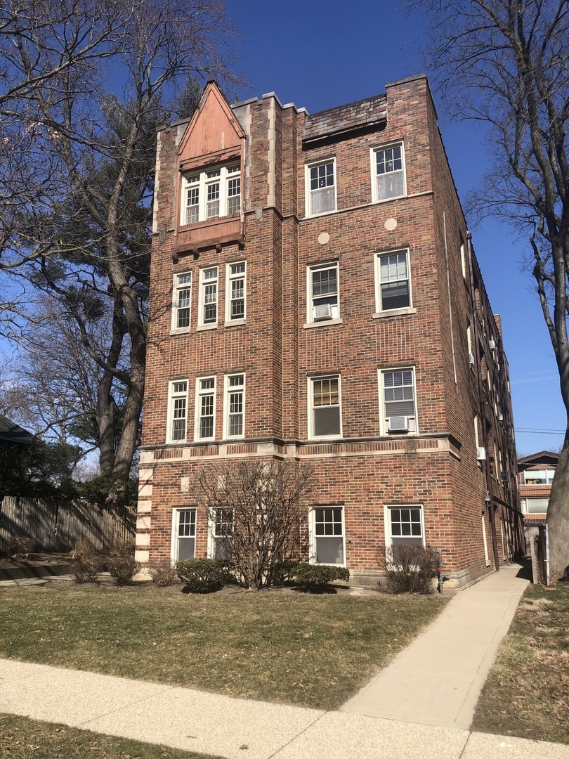 70 Pine Avenue, Unit 1A Riverside, IL 60546 - Photo 1 of 7 a front view of a house