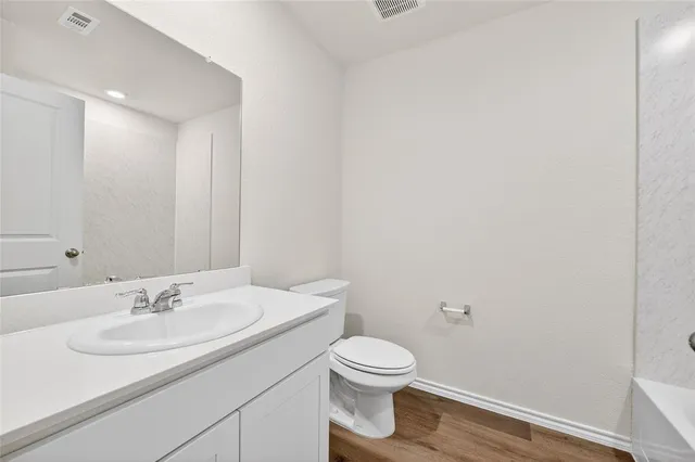 a bathroom with a sink and a toilet