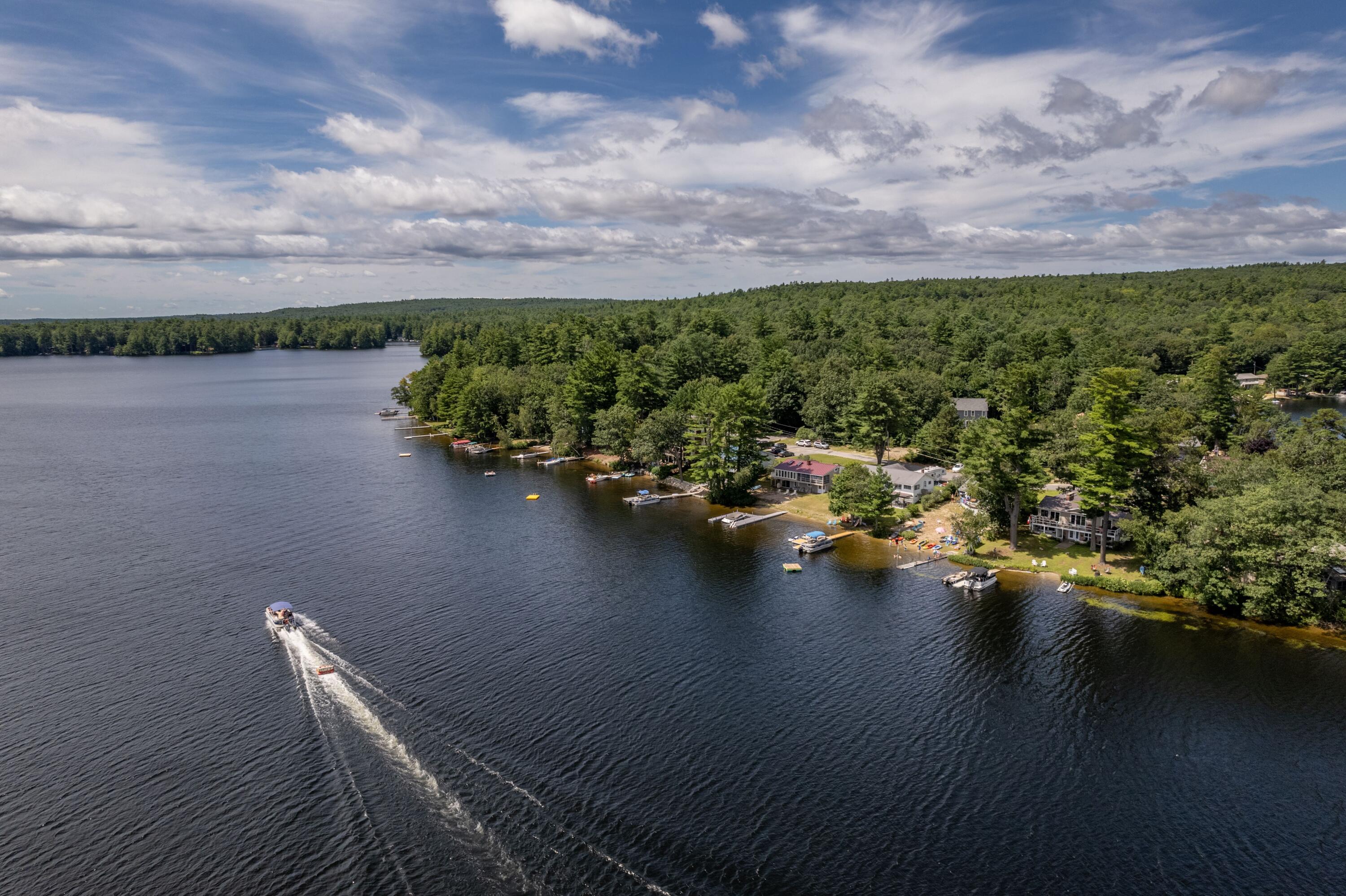 16 Krams Point Road Gray, ME 04071 - Photo 50 of 53 lake aerial shot with boat