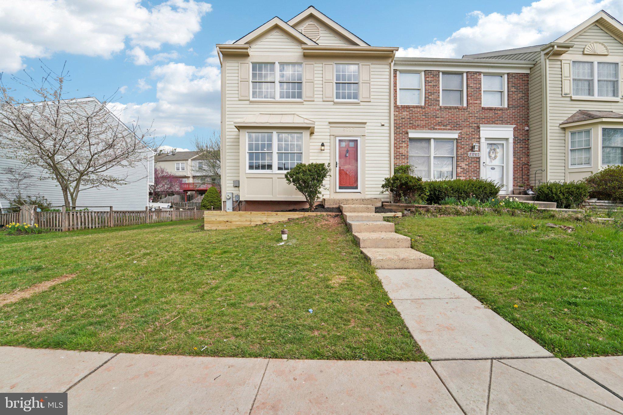 8727 Silver Hall Road Perry Hall, MD 21128 - Photo 1 of 35 a front view of a house with a yard