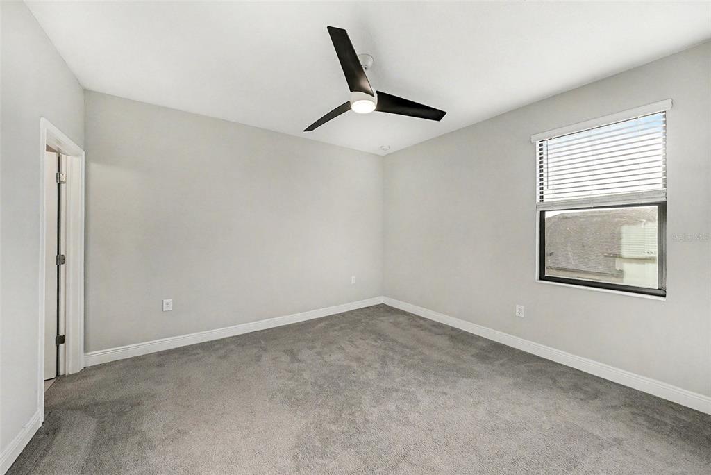 13638 Moosehead Circle Hudson, FL 34669 - Photo 20 of 24 a view of an empty room with a window