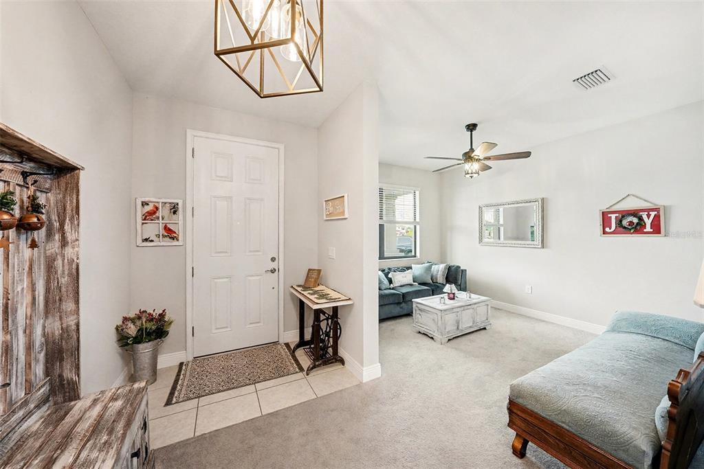 13638 Moosehead Circle Hudson, FL 34669 - Photo 3 of 24 a living room with furniture