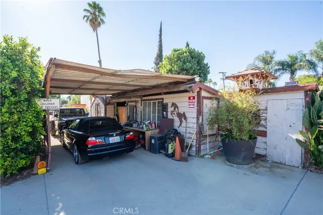 a car parked in front of a house