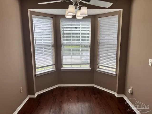 a kitchen with stainless steel appliances a refrigerator stove microwave and cabinets
