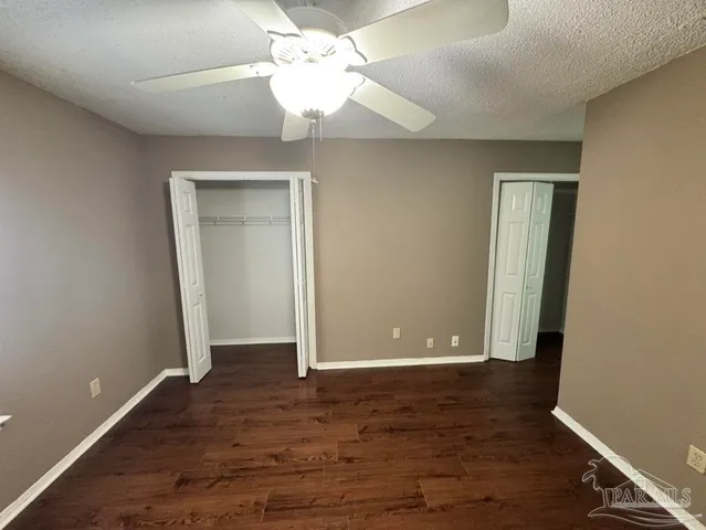 a bathroom with a sink a mirror and a toilet
