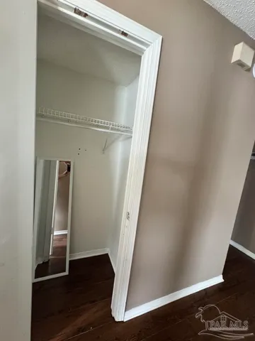 a view of outdoor space with wooden floor