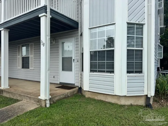 a view of a room with a yard