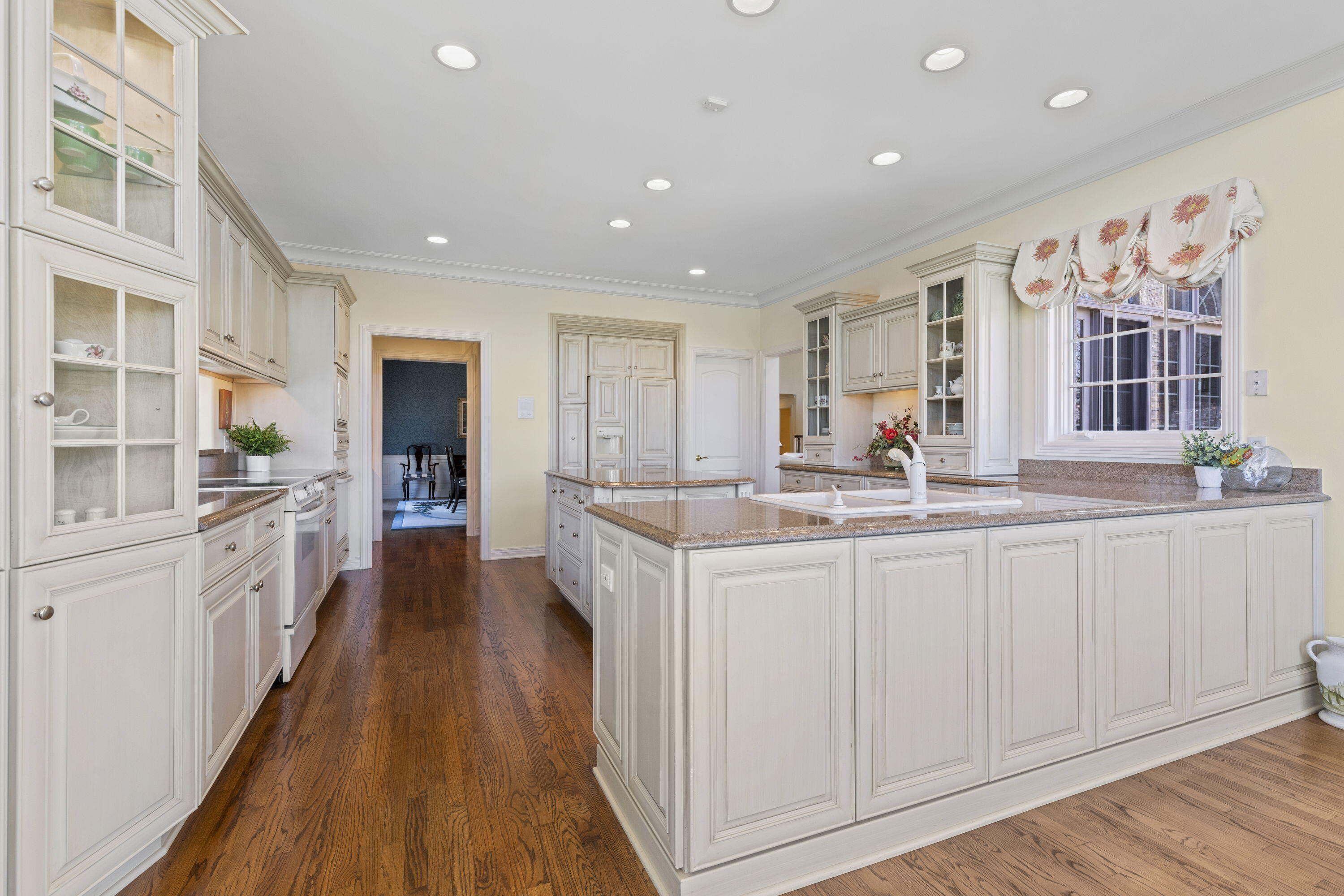 1663 Snead Avenue Chesterton, IN 46304 - Photo 12 of 38 a kitchen with counter top space and wooden floor