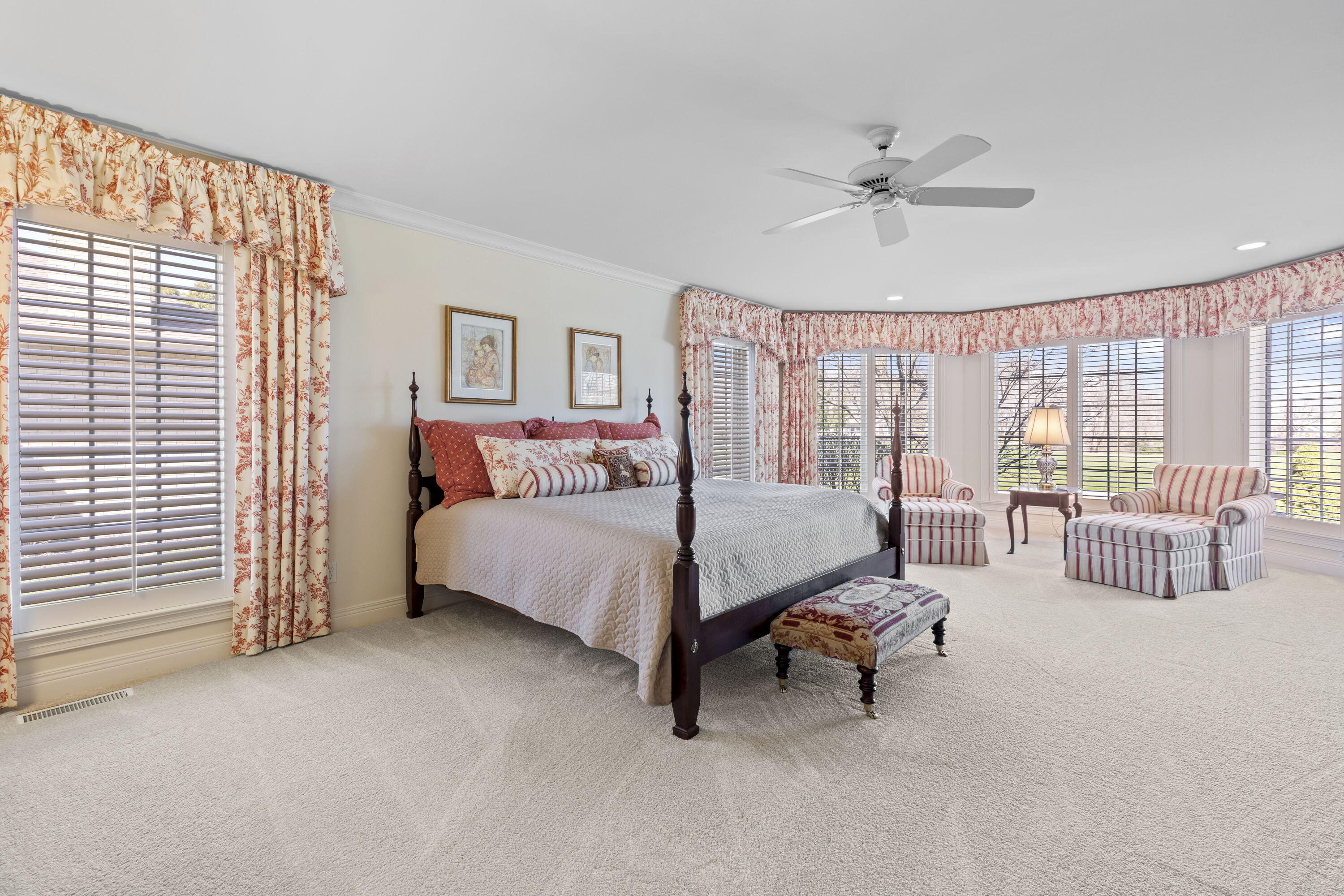 1663 Snead Avenue Chesterton, IN 46304 - Photo 16 of 38 a bedroom with a bed and a chandelier