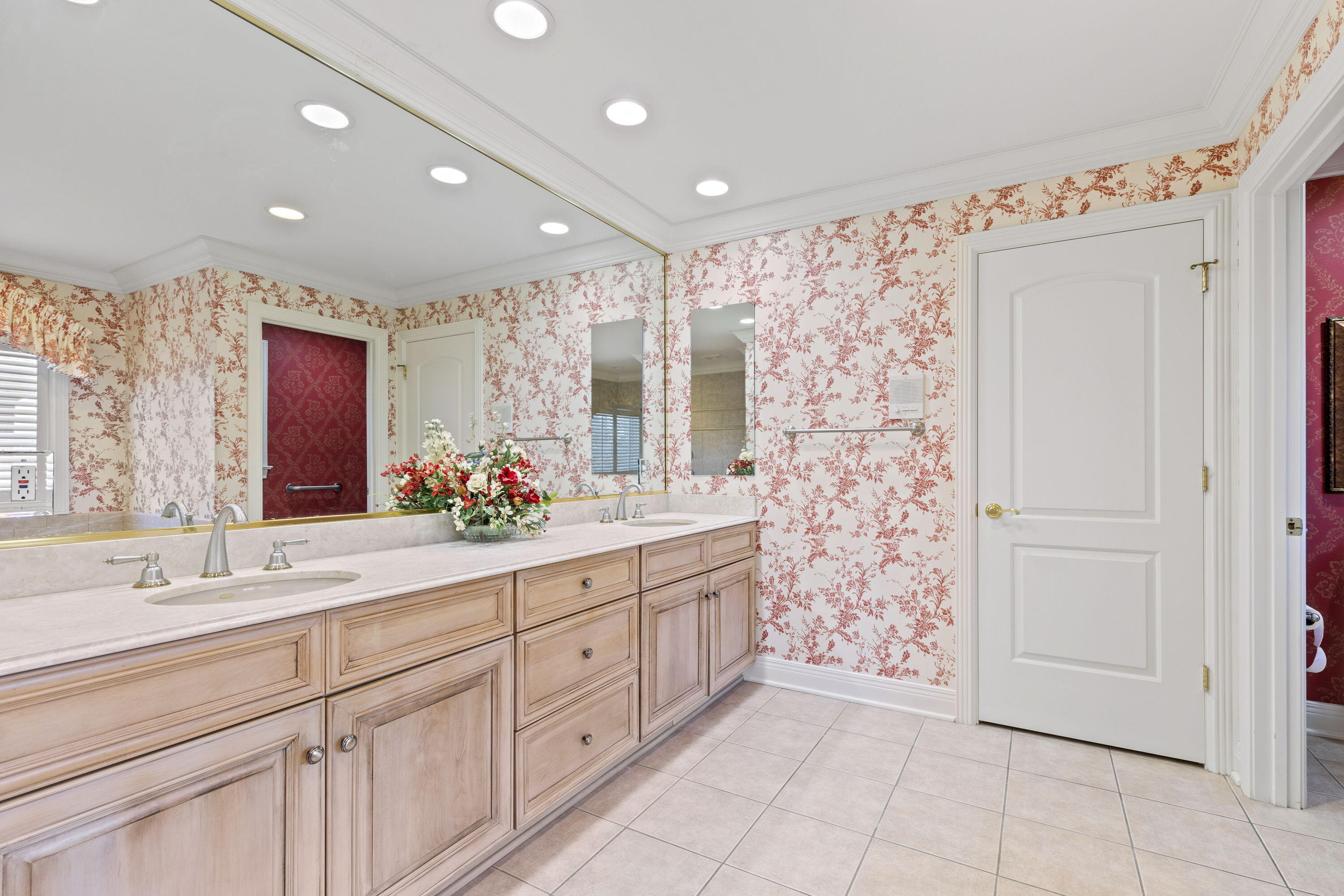 1663 Snead Avenue Chesterton, IN 46304 - Photo 19 of 38 a spacious bathroom with a double vanity sink mirror and shower
