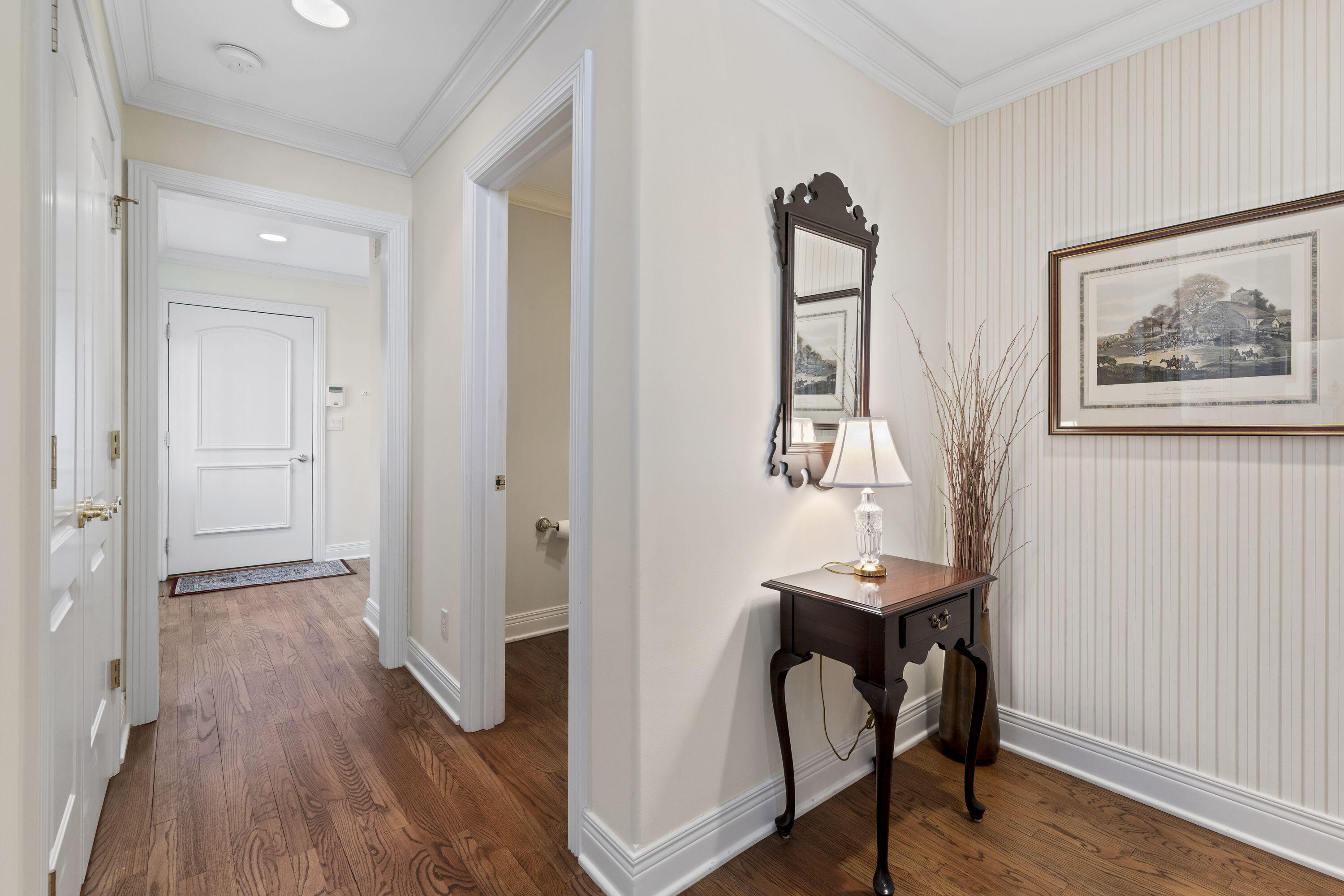 1663 Snead Avenue Chesterton, IN 46304 - Photo 21 of 38 a view of a hallway with workspace and wooden floor