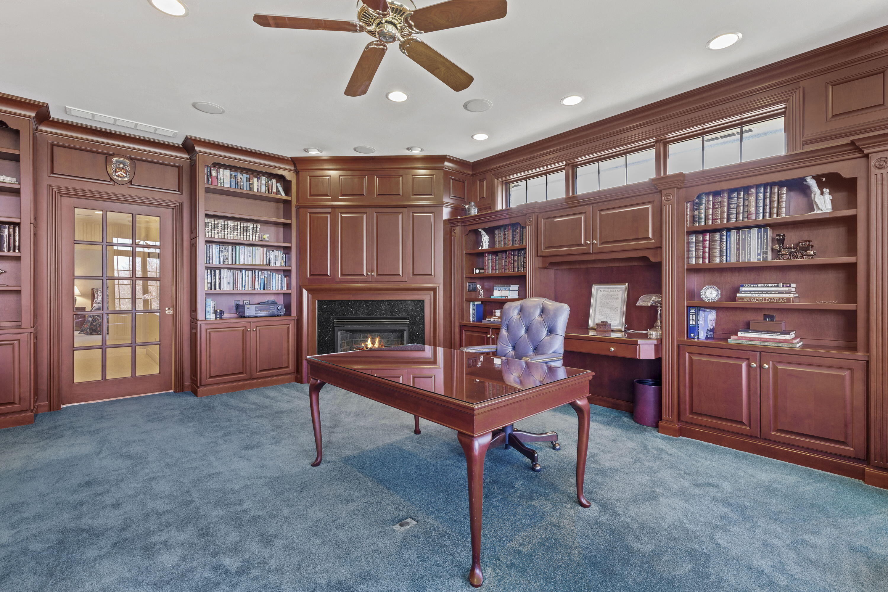 1663 Snead Avenue Chesterton, IN 46304 - Photo 24 of 38 a living room with furniture a piano and a bookshelf
