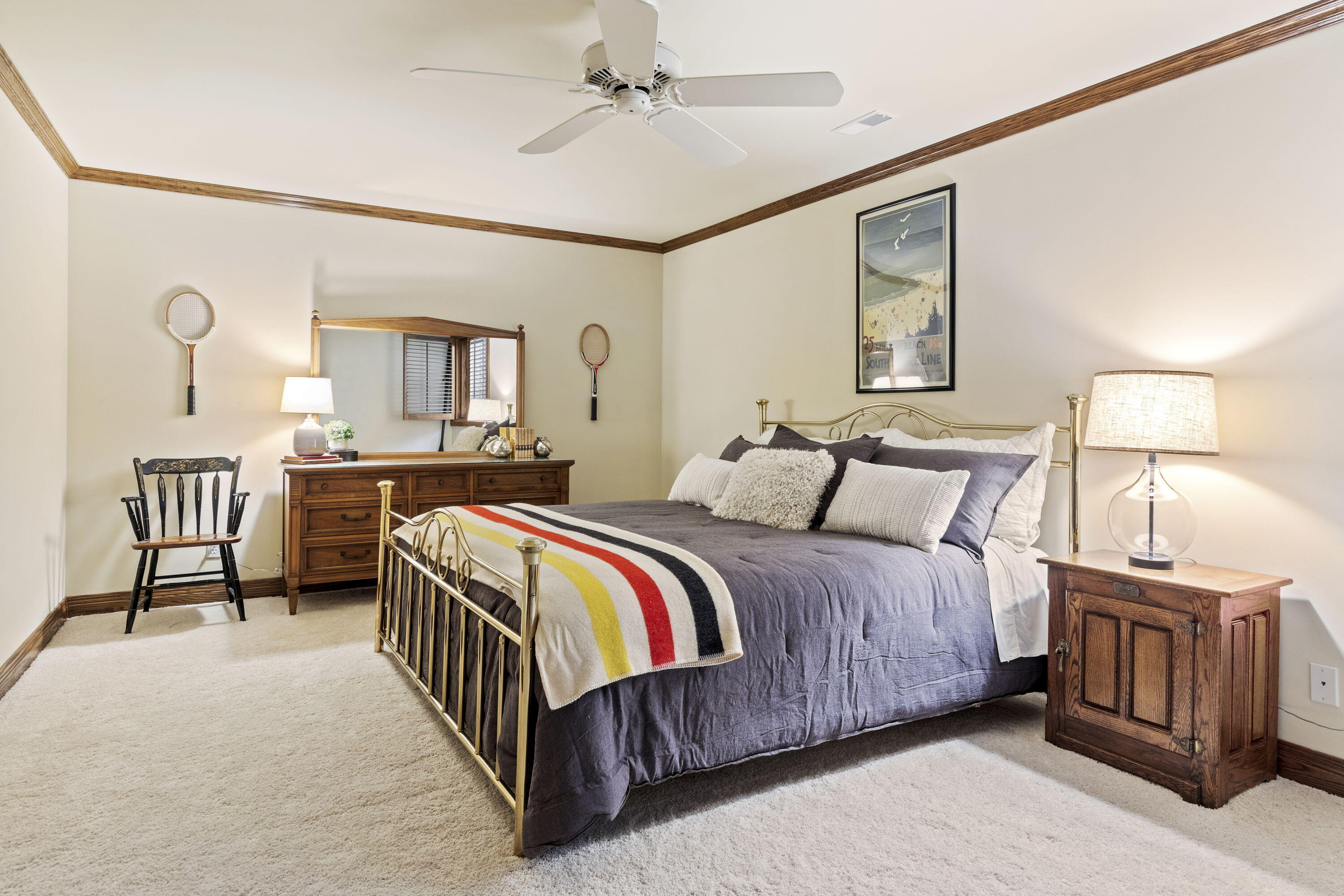 1663 Snead Avenue Chesterton, IN 46304 - Photo 30 of 38 a bedroom with a bed and a chandelier