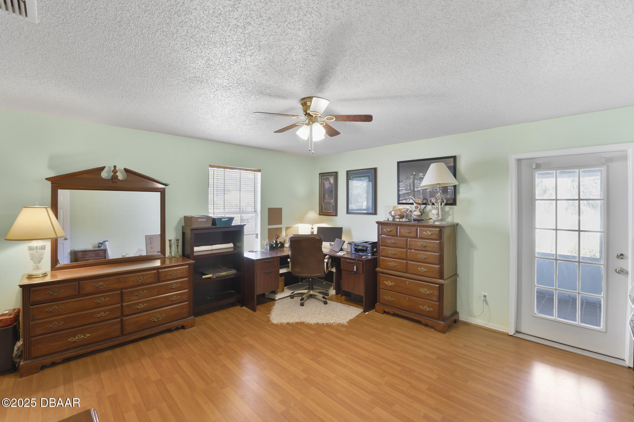 13 Fernery Trail Ormond Beach, FL 32174 - Photo 34 of 57 a living room with furniture and wooden floor